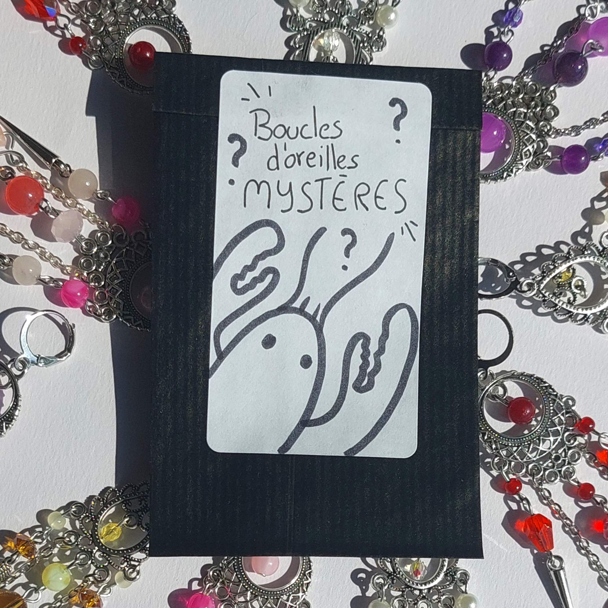 Boucles d'oreilles mystères argentées